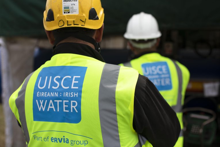 Two Irish Water engineers while they have their back turned