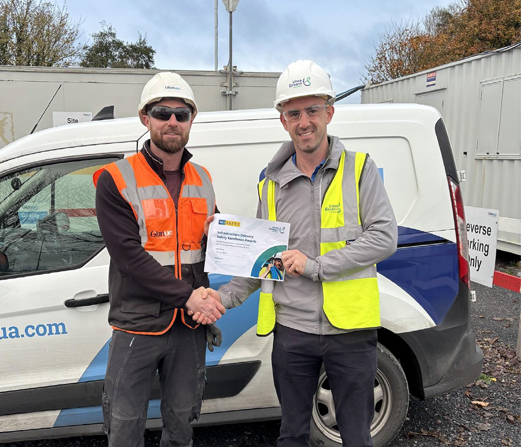 Eamon Ryan being awarded an award
