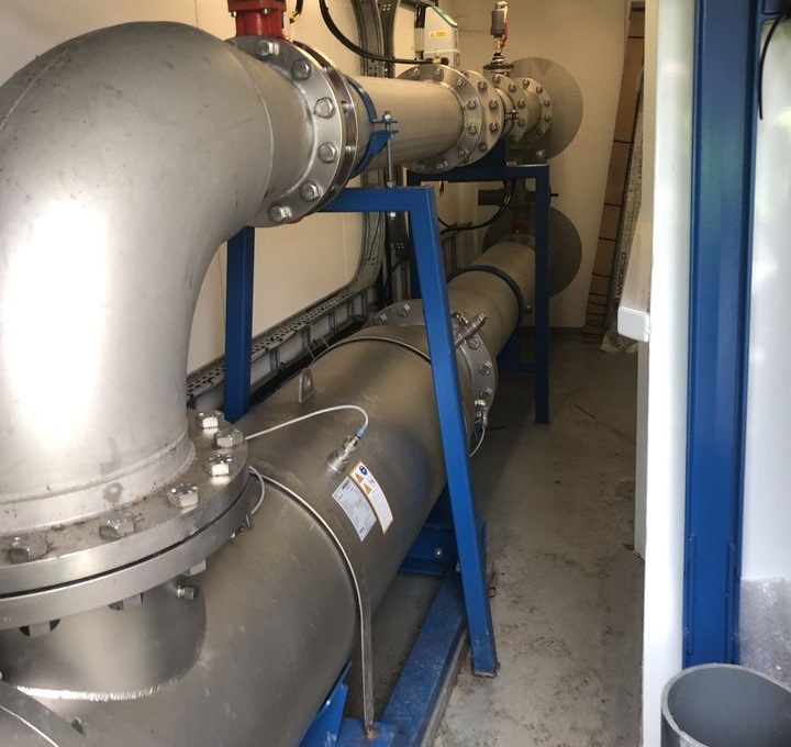 A room with two large pipes