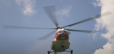 Helicopter flying above