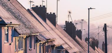 Frost on the roofs' of a row of houses 