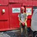 Brian McGeady in front of a Safety Site Office 