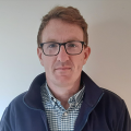 A headshot of Eoin Geary