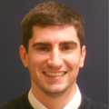 A headshot of John Ryan