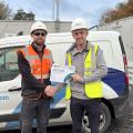Eamon Ryan being awarded an award