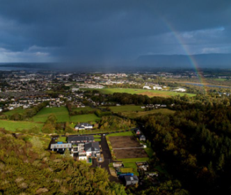 A rainbow over a town
