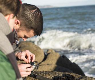 A father and son fishing in the sea