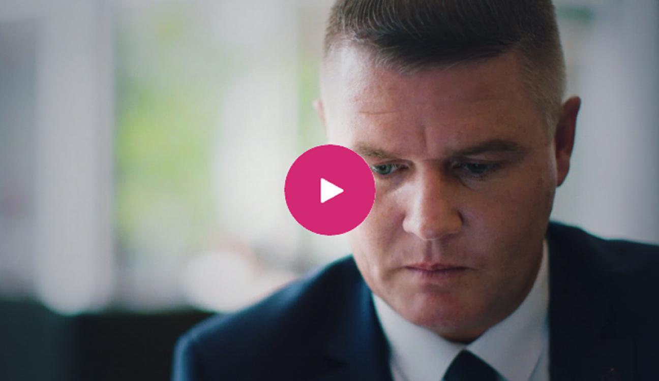 A person wearing a suit